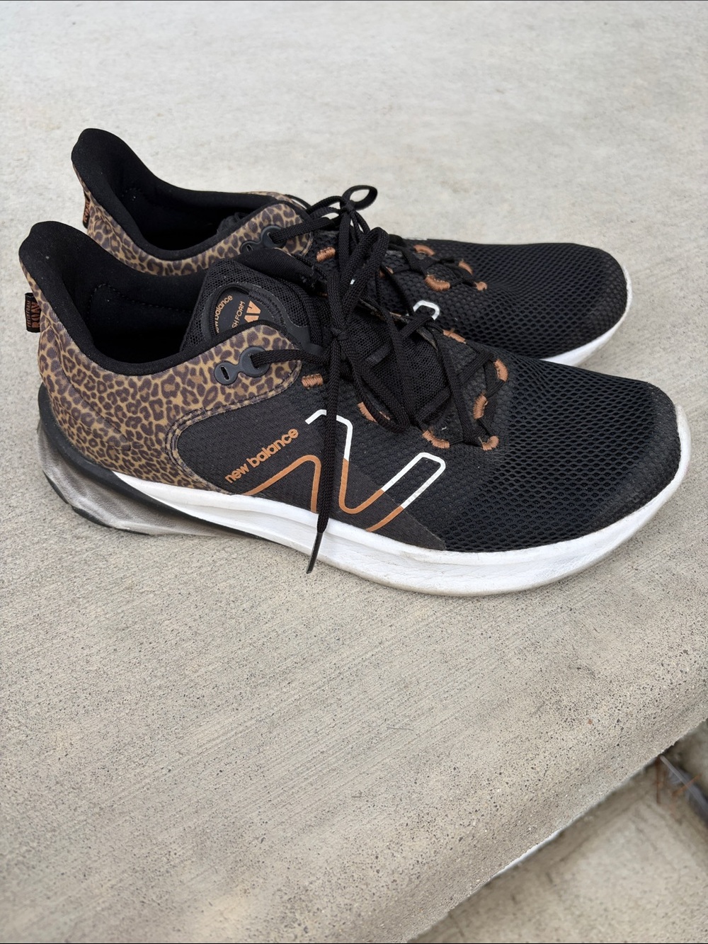 New Balance Black Athletic Sneakers with Leopard Print Accents